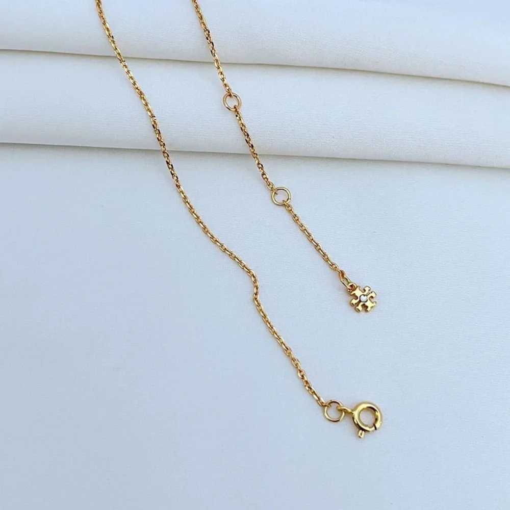 Tory burch Gold Heart and Puzzle Pendant Necklace - Picture 5 of 10